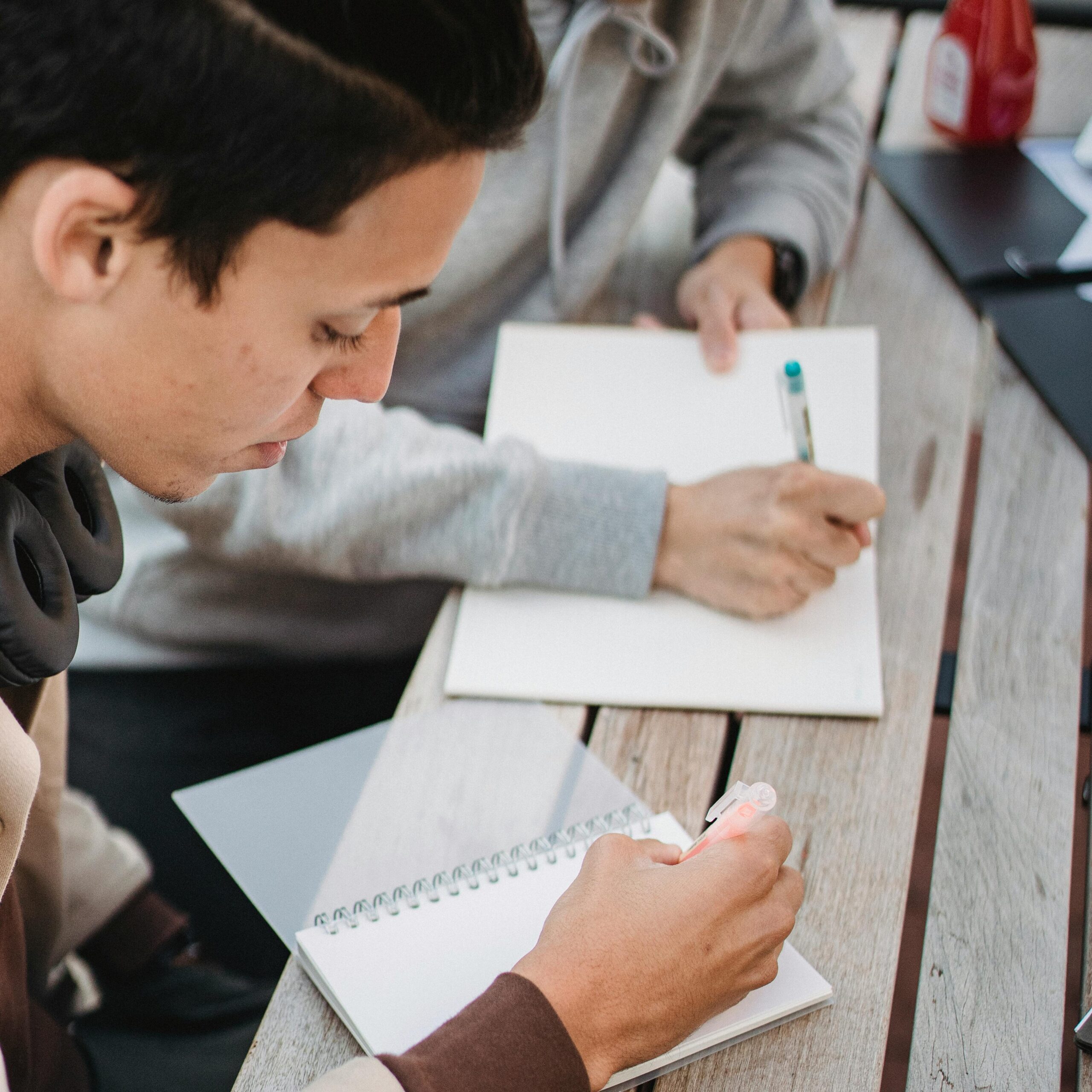 students writing in journals